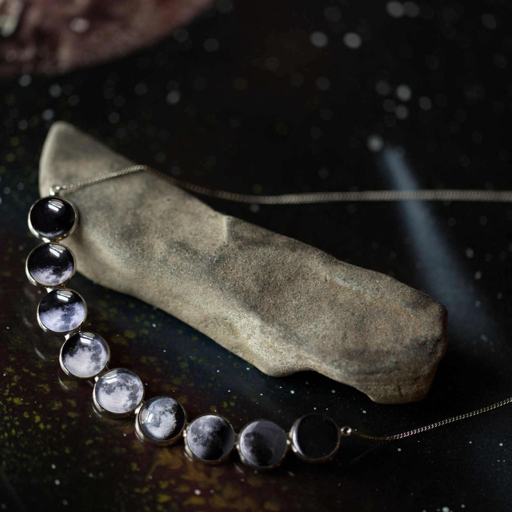 Curved Moon Phase Necklace in Silver - My Modern Met Store